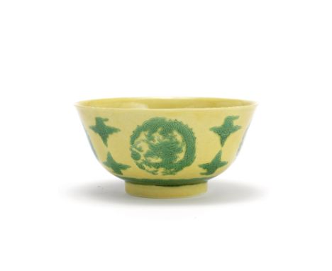 A yellow-ground green-enamelled 'dragon' bowlUnderglaze blue Daoguang seal mark and of the periodThe exterior decorated with 