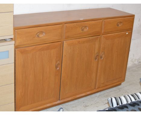 ERCOL LIGHT OAK SIDEBOARD - APPROXIMATE DIMENSIONS = 37" x 61" x 17" (HxWxD)
