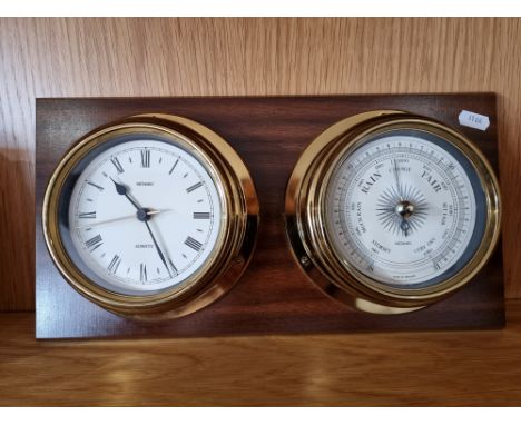 Metamex, a 5 "quartz clock and barometer bulk head set, mounted on a mahogany plaque, 