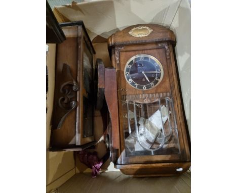 Three wall clocks in need of restoration and a mahogany wheel barometer 