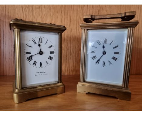 A brass carriage time piece, with white enamel dial, signed T, Fattorini, Bolton &amp; Skipton, key 11 cm and another carriag