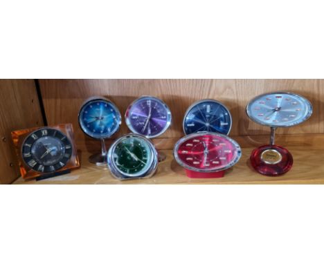Molnija, a Russian orange plastic mantle clock, the dial signed and Made in USSR, 13 cm, Big Ben Repeater Westclox purple ped