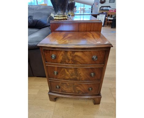 A mahogany bow front chest of three drawers, 54 x 41 x 66 cm. 