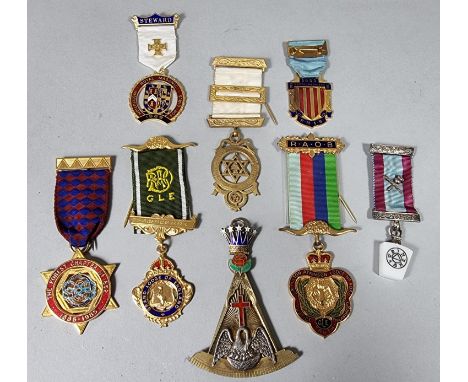 A silver, silver gilt and enamel Masonic jewel, London 1938, 2 oz, a silver jewel and six gilt metal RAOB jewels 