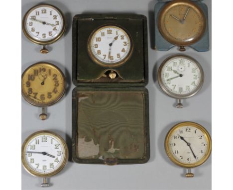 A Tiffany &amp; Co 8 day travelling clock, two Elkington &amp; Co examples and 4 other examples. 