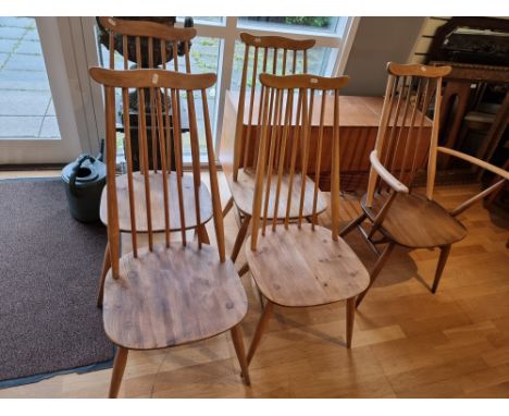 A set of 4 Ercol Goldsmith Windsor stripped elm and beech dining chairs stamped BS 1960 and 2055, together with a later match