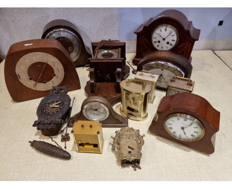 A mahogany and inlaid cased mantle clock together with carriage clocks and wall clocks. 