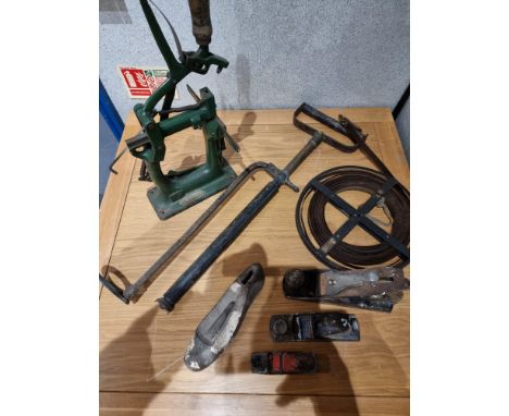 A Bristol stirrup hand pump together with Stanley &amp; Record planes and a German made cast iron bench punch and a Grundig T