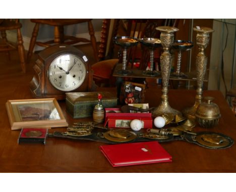 A pair of brass candlestick holders (35 cm tall), together with plated chalice, a squirrel skull, a brass trivet, two smoking