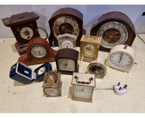 A collection of early manual wind mantle clocks together with later battery operated examples. 