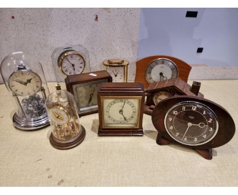 An Elliott mahogany cased manual wind mantle clock together with Anniversary and other mantle clocks. 