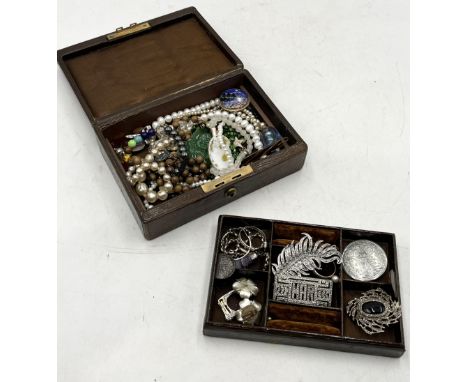 A collection of various costume jewellery including 925 silver, marcasite brooches, beads, pearls etc. in vintage leather jew