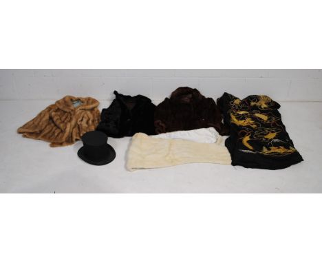A quantity of vintage clothing, including a collapsable top hat by 'Bennetts' of London, a fur wrap, three fur coats includin