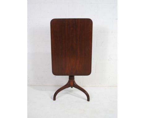 A Georgian mahogany rectangular tilt-top tripod table, with turned base, marked 'Ingrams Makers, 29 City Road, London'