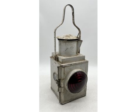A British Railways Midlands signal lamp / lantern complete with inner burner and red glass lens to front. White painted. Embo