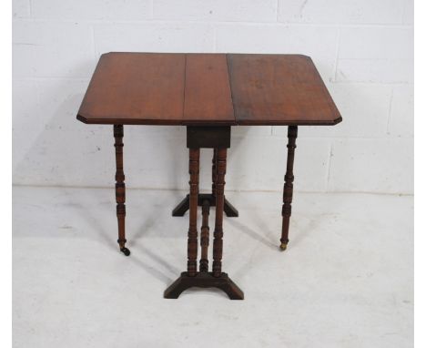 A Victorian mahogany Sutherland table, with bobbin turned supports