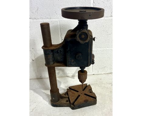 A vintage manual pillar drill. 