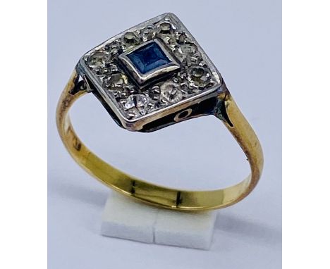 An Art Deco cluster ring set with diamonds and sapphire in 9ct gold, size M 1/2