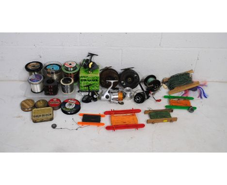 A small quantity of various fishing tackle and reels, including a boxed Intrepid Deluxe model 3010, Intrepid "Classic", Penn 