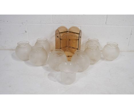 A quantity of glass lamp shades, including mostly etched glass oil lamp shades
