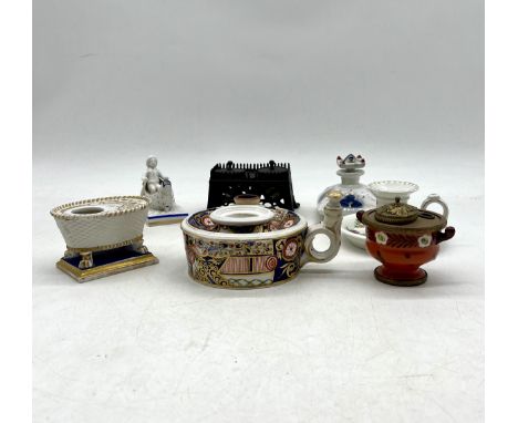 A collection of antique and vintage ink wells including crown derby, lot also includes a chamberstick etc 
