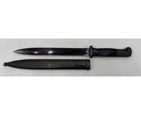 A German WWII bayonet by Clemen & Jung, the blade numbered 3846b, the metal scabbard marked 41asw and 6929