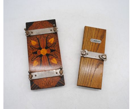 A vintage wooden tie press along with a flower press