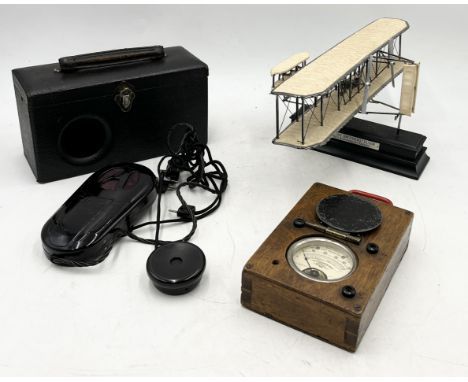 A vintage Ardent boxed hearing aid along with a Franklin Mint "Wright Flyer" 100th anniversary model (A/F) and a vintage wood