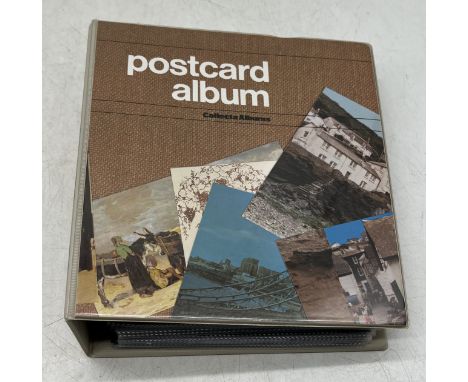 A part complete album of vintage mostly black and white postcards and photos including steam locomotives, ships, a submarine 