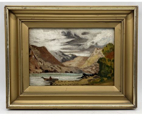 An signed oil showing a Canadian mountainous lake scene with figure to the foreground in a canoe, label to the back for David