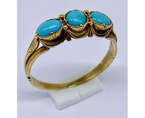 An unmarked gold (15ct tested) turquoise 3 stone ring, size L