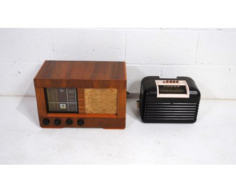 A vintage Bush DAC-10 bakelite radio, along with a cased Etronic R640 radio