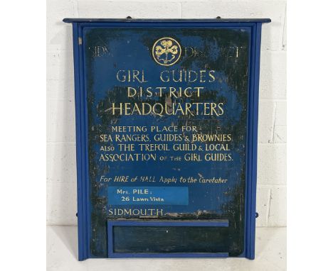 A vintage painted board for "Sidmouth District Girl Guides District Headquarters - A meeting place for Sea Rangers, Guides & 