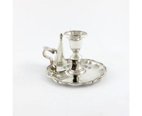 A Victorian silver chamber stick, by Henry Wilkinson and Co, Sheffield 1853, circular form, moulded border, scroll handle, wi