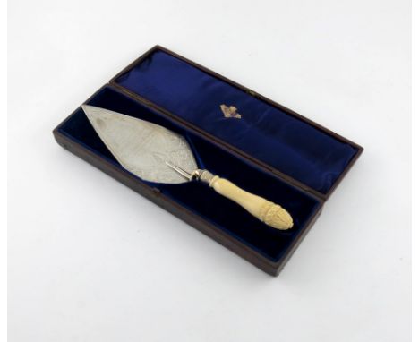 λ A Victorian presentation silver trowel, by Henry Wilkinson and Co, Sheffield 1875, the triangular blade with an inscription