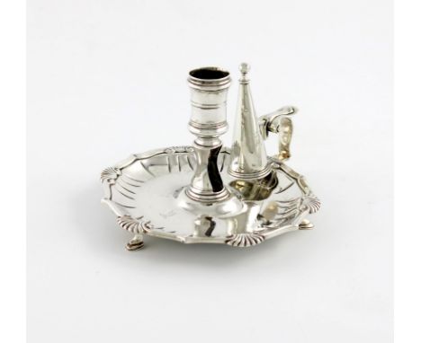 A Victorian silver chamber stick, by William Carter, London 1845, circular form, scroll and shell border, spool shaped capita