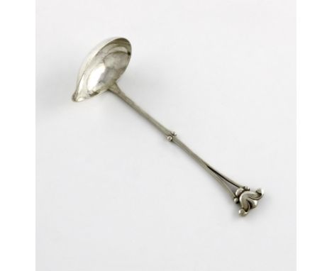 By Georg Jensen, a Danish silver cream ladle, design no. 129, assay date 1926, assay master C. F. Heise, with import marks fo