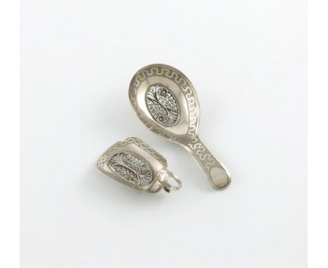 A George III silver caddy spoon, by Samuel Pemberton, Birmingham 1807, oval bowl, set with an oval filigree panel, engraved w