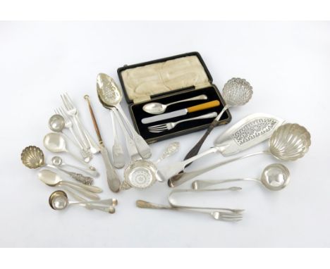 A mixed lot of silver flatware, comprising: a small soup ladle, a French sifting spoon, another sifting spoon, a fish slice, 