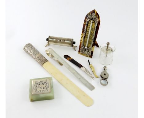 λ A collection of silver desk accessories, comprising: a silver-mounted tortoiseshell thermometer, by H. Matthews, Birmingham