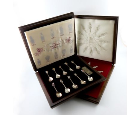 A set of ten modern silver and enamel Queen's Beasts spoons, Birmingham 1977, in a fitted case, plus a set of twelve Apostle 