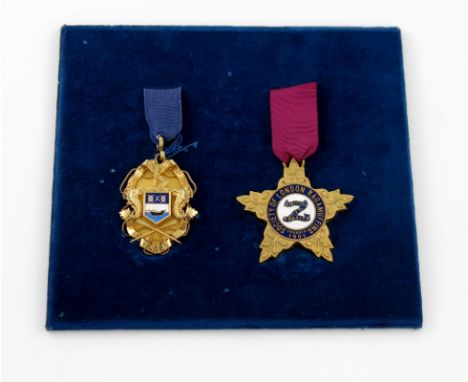 Two silver-gilt and enamel waterman's badges, unmarked, comprising: one enamelled with the arms of the Worshipful Company of 