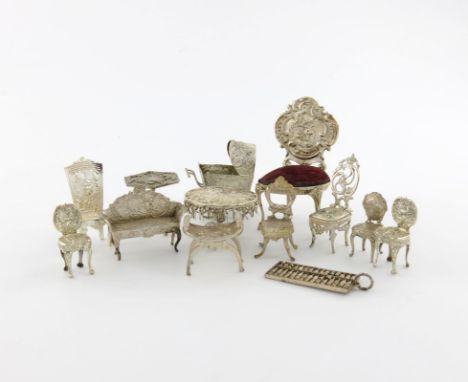 A collection of silver miniatures, comprising: a chair with a velvet seat, Birmingham 1901, possibly for use as a pin cushion