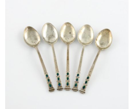 By Liberty and Co, a set of five silver and enamel teaspoons, Birmingham 1936, the tapering stems with intertwined and blue g