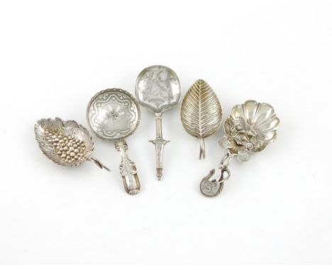 A small collection of five silver caddy spoons, comprising: a George III one of leaf form, by Joseph Taylor, Birmingham 1800,