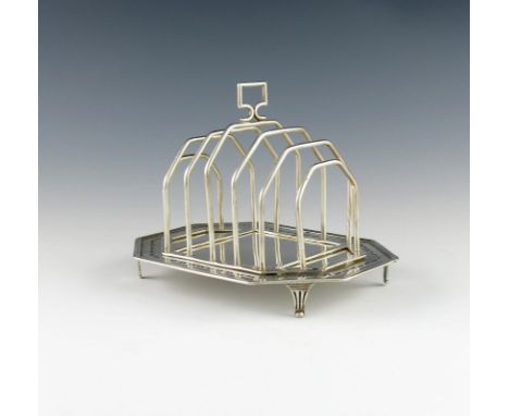 A George III silver toast rack base with an unmarked detachable toast rack, by Robert Hennell, London 1790, rectangular form,
