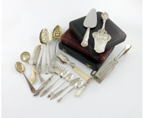 λ A mixed lot of silver flatware, various dates and makers, comprising: a pair of George IV serving tongs, London 1825, a sma