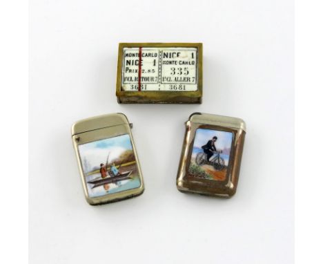 A late 19th century electroplated and enamel vesta case, unmarked, the front enamelled with fishing scene of two fishermen in