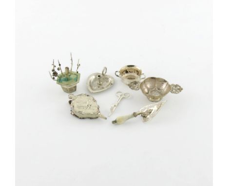 A mixed lot of silver miniatures, comprising: a box modelled as a pair of bellows, with import marks for London 1905, with fi