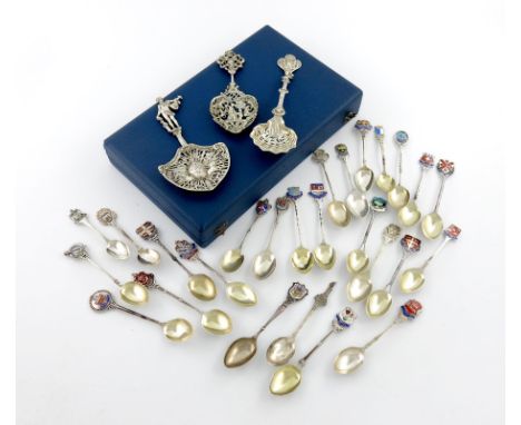 A mixed lot of silver items, various dates and makers, comprising: three pierced sifting spoons and various silver and enamel